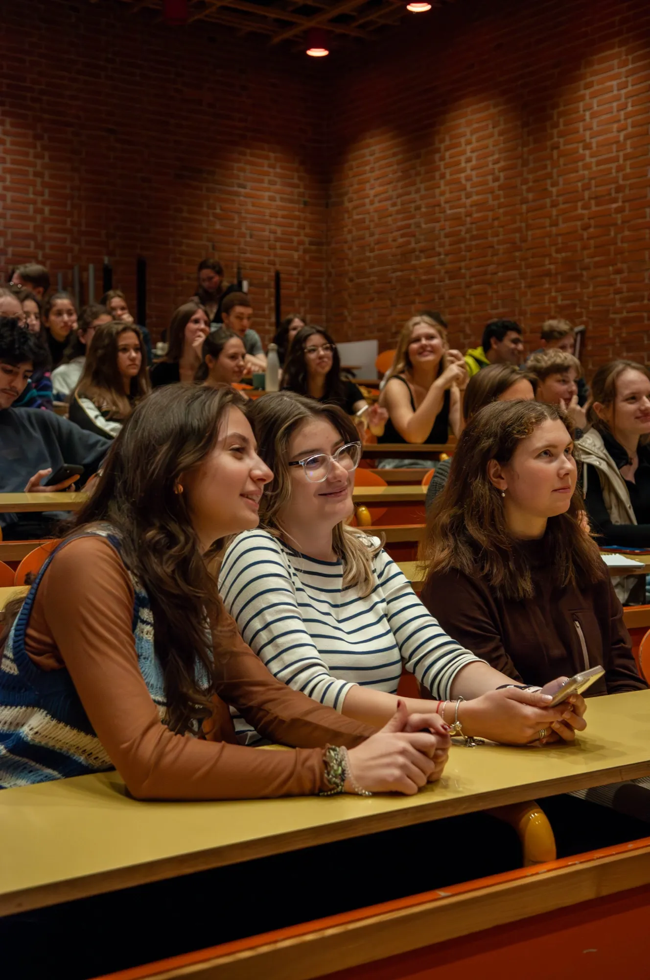 Students listening in a workshop